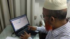 A doctor using the Doctor Koi platform on their laptop